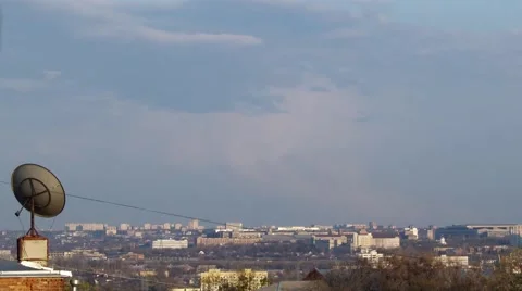 The satellite dish on the background of the city. Time-lapse videos. Stock Footage 49432192
