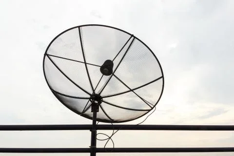 Satellite dish with cloudy sky. Foto stock