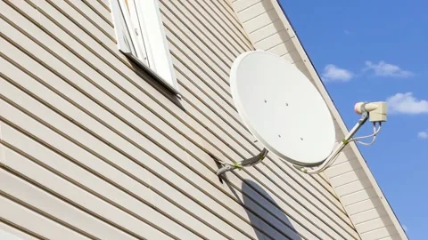 Satellite dish on a house Stock Footage 141413101