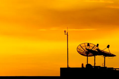 Satellite dish at sunset Foto stock