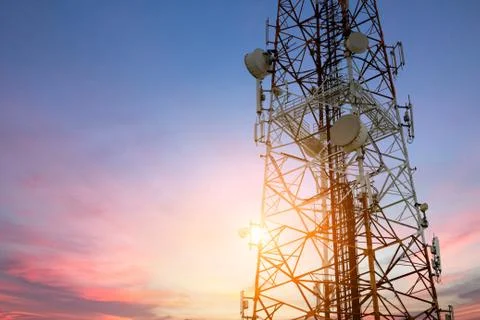Satellite dish telecom network at sunset communication technology network Stock Photos