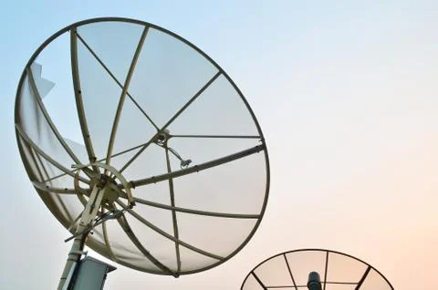Satellite dish at twilight Stock Photos