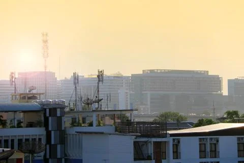 Satellite dishes on rooftops Stock Photos