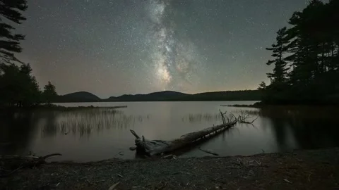 Satellite launch time lapse into the Milky Way galaxy over Eagle Lake in Maine Stock-Footage 232639523
