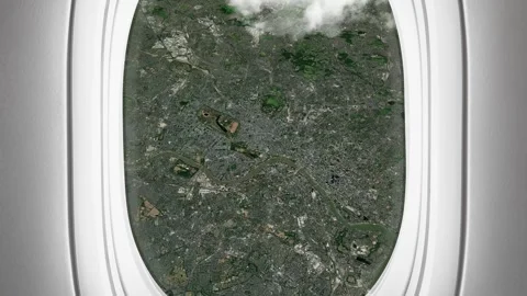 Satellite London map background loop. Airplane salon passenger seat window .. Stock Footage 259994698