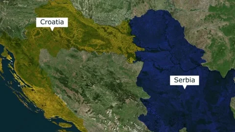 Satellite map view highlighting croatia in yellow and serbia in blue 库存影片 345992263