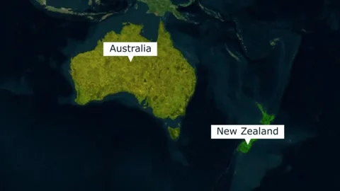 Satellite map view showing australia and new zealand with location labels 库存影片 345992402