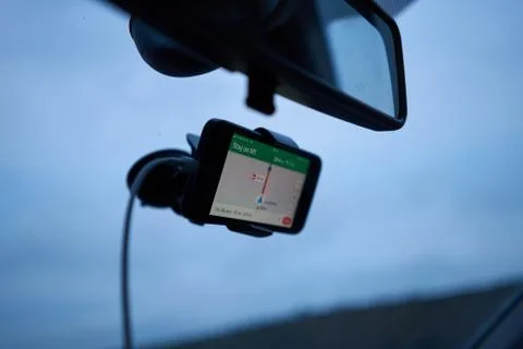Satellite navigation on car window showing delays on the M1 Stock Photos