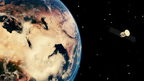 Satellite orbiting around planet earth. a satellite observing the earth Stock Footage 325049771
