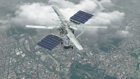 Satellite orbiting a city, showcasing Earth's urban landscape. Stock Footage 295746430