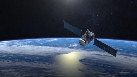 The satellite is orbiting the Earth. The satellite is flying from afar. The Video stock 81104476