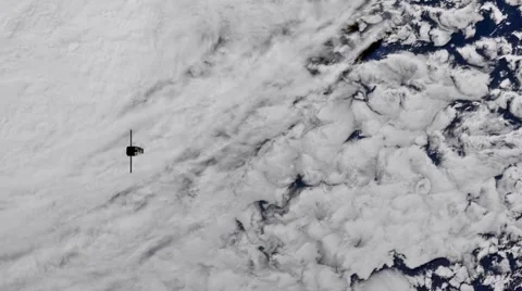 Satellite Orbits The Earth With Stormy Cloudy Ocean Background Stock Footage 62070641