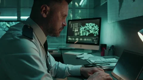 Satellite System Operator Working on Laptop at Military Command Center Stock Footage 296154405