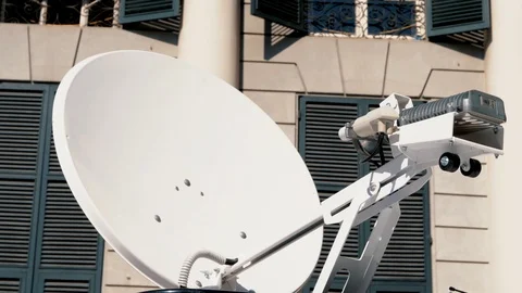 Satellite on the top a van that connects to internet  Stock Footage 105572202