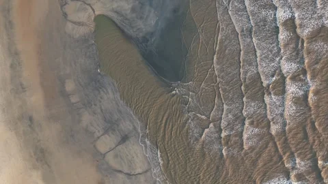 Satellite view captures river delta merging with coastal plain Stock Footage 337723352