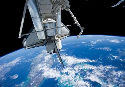 Satellite view. Space shuttle over the Florida . Elements of this image furni Stock Photos