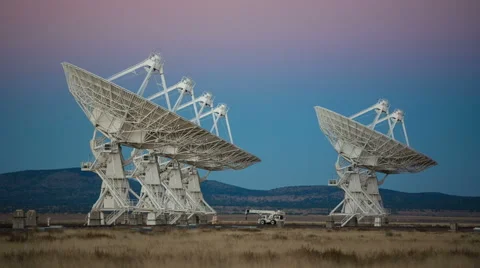 Satellites Rotating Slowly During Sunset Stock Footage 60218511