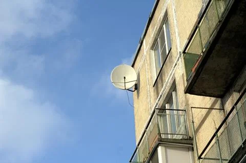 Satellitte On The Wall 5th Level House Stock Photos