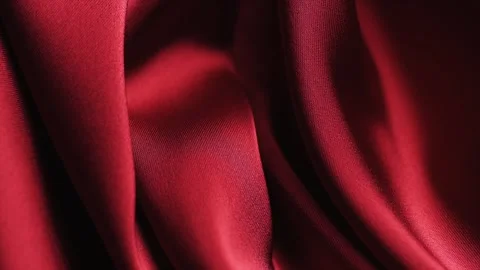Satin backdrop, red color silk background, texture of beautiful red satin fabric Video stock 336953570