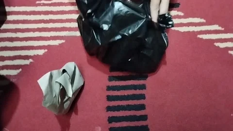 Satio took out 3 packets of porridge from black plastic Stock Footage 212795421