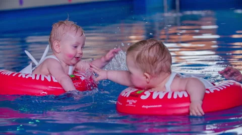 Satisfaction for baby during the first bathing Video stock 54081098