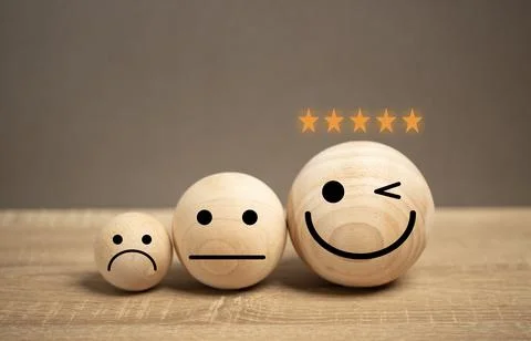 Satisfaction icon on the table. the feedback for the customer give the rate.. Stock Photos