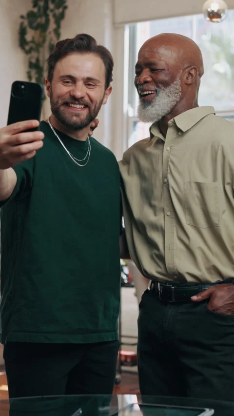 Satisfaction, selfie and smile of men in barbershop for social media post of Stock Footage 340449153