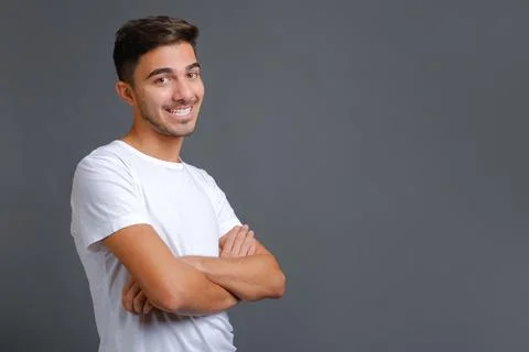 Satisfied caucasian guy looking at camera with a big laugh Stock Photos