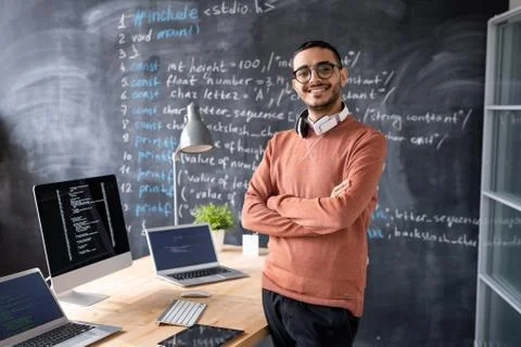 Satisfied computer programmer in office Stock Photos