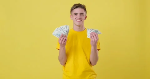 Satisfied Man throwing cash dollars on air 库存影片 144956771
