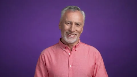 Satisfied middle aged man look in camera isolated vibrant color background Stock Footage 167008448