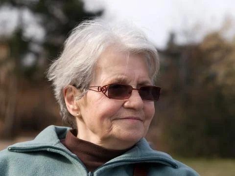 Satisfied old lady Stock Photos