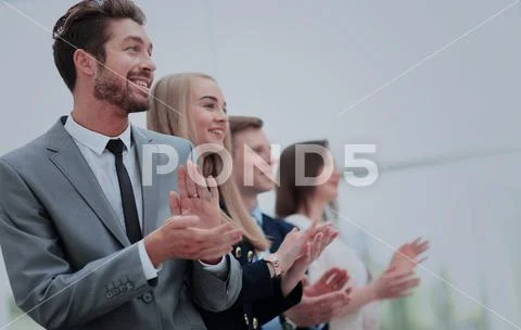 Satisfied proud business team clapping hands Stock Photos