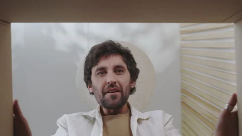 Satisfied shopper opening parcel box at home 스톡 동영상 171451910