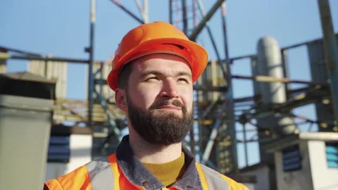 Satisfied technical person engineer inspecting building site supervise fieldwork Stock Footage 150355797
