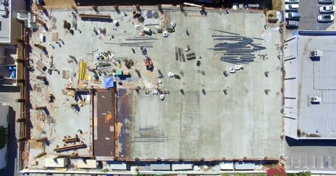 Satlapse, Aerial  view of Construction workers at development site, 4K Stock Footage 54943313