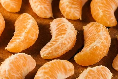 Satsuma Mandarin Tangerine Fruit Wedge Layout Abstract (Citrus unshiu) Stock-Fotos