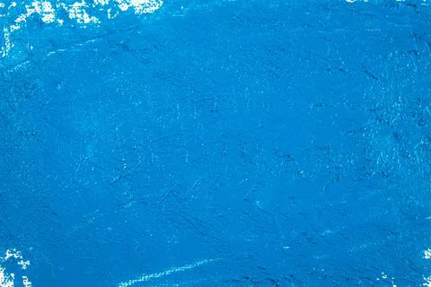 Saturated blue abstract background, applied toning primer on a white surface Stock Photos