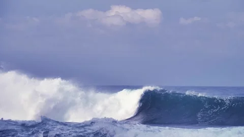 Saturated Blue Waves Sea Sky White Clouds and Foam Stock Footage 280378036