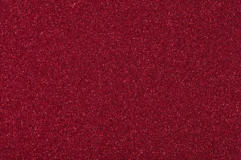 Saturated dark red glitter background, your lovely texture for personal design. Stock Photos