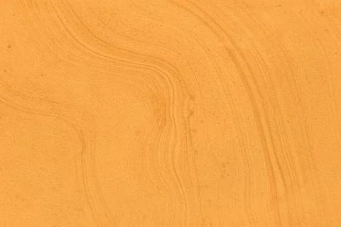 Saturated orange low contrast Concrete textured background Stock Photos
