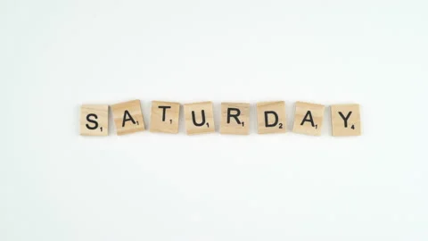 Saturday Written In Scrabble Blocks. 4k Shot Of Hand Placing Wooden Game Stock Footage 156364765