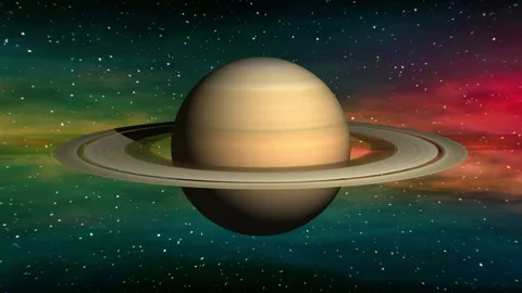 Saturn on space nebula background Stockbeeldmateriaal 90529730