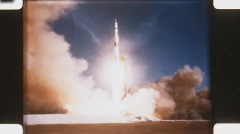 Saturn V rocket liftoff. (Vintage 1960’s 16mm film footage). Stock Footage