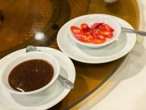 Sauce and chilli serve on the table Foto stock