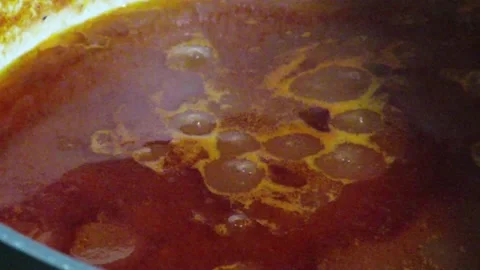 Sauce boiling in the pot Stock Footage 133314466