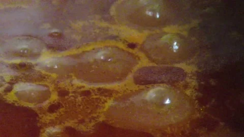 Sauce boiling in the pot Stock Footage 133314479