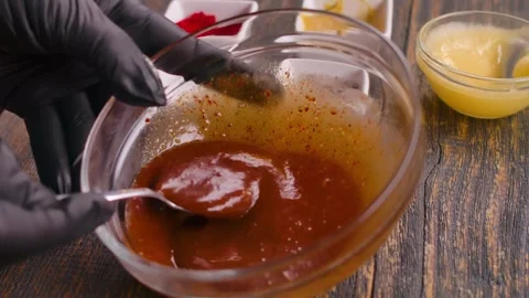 Sauce for coating the duck for roasting Stock Footage 302214610