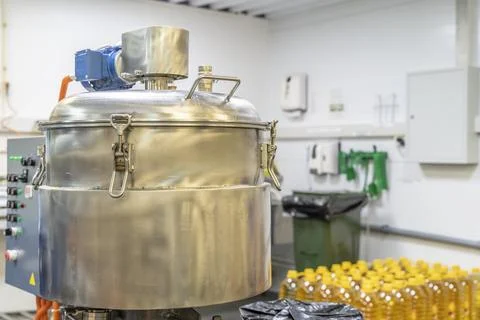 Sauce Industrial process. The process of operation of the cutter in food Stock Photos