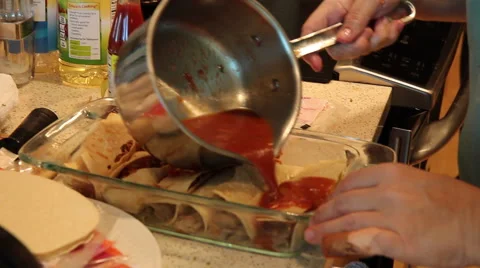 Sauce Poured Over Enchiladas Stock Footage 61463458